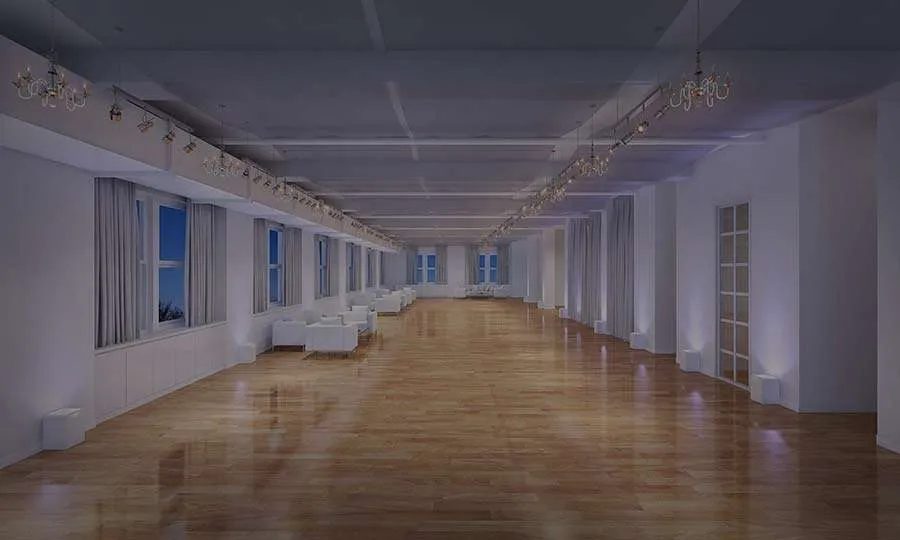 The Loft's oak floors, chandeliers, and long windows